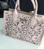 حقيبه يد من ماركهbebe - زهري فاتح