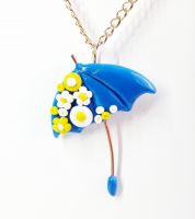 تعليقة وعقد على شكل شمسية