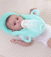 مخدة لاطعام الطفل فستقي