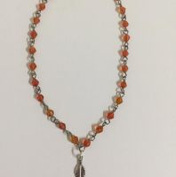   تعليقة ريش مع خرز  برتقالي 