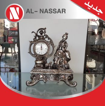 انتيكا على شكل بنت و ساعة 