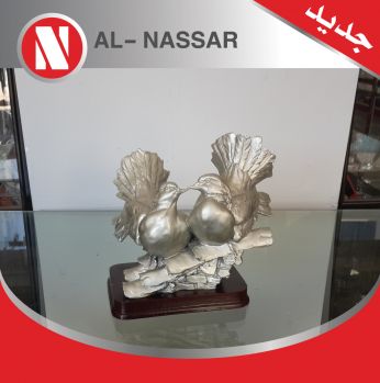 انتيكا على شكل جوز حمام 